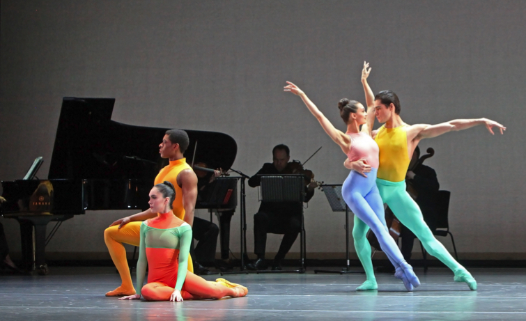 Dancers and on stage musicians in The Thousandth Orange