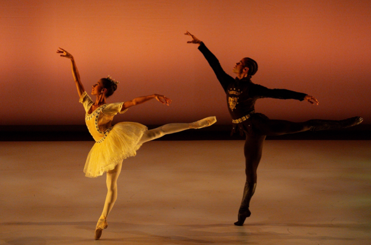 Royal Ballet dancers Mariana Tsembenhoi & Joseph Sissens in arabesque
