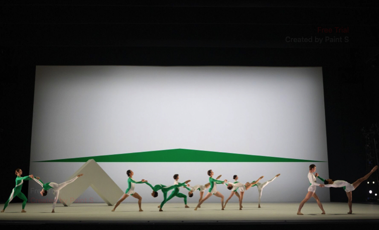 Artists of the Royal Ballet in green and white body-hugging costumes dance against minimalist white canvas it a green motif as part of Wayne McGregor Alchemies